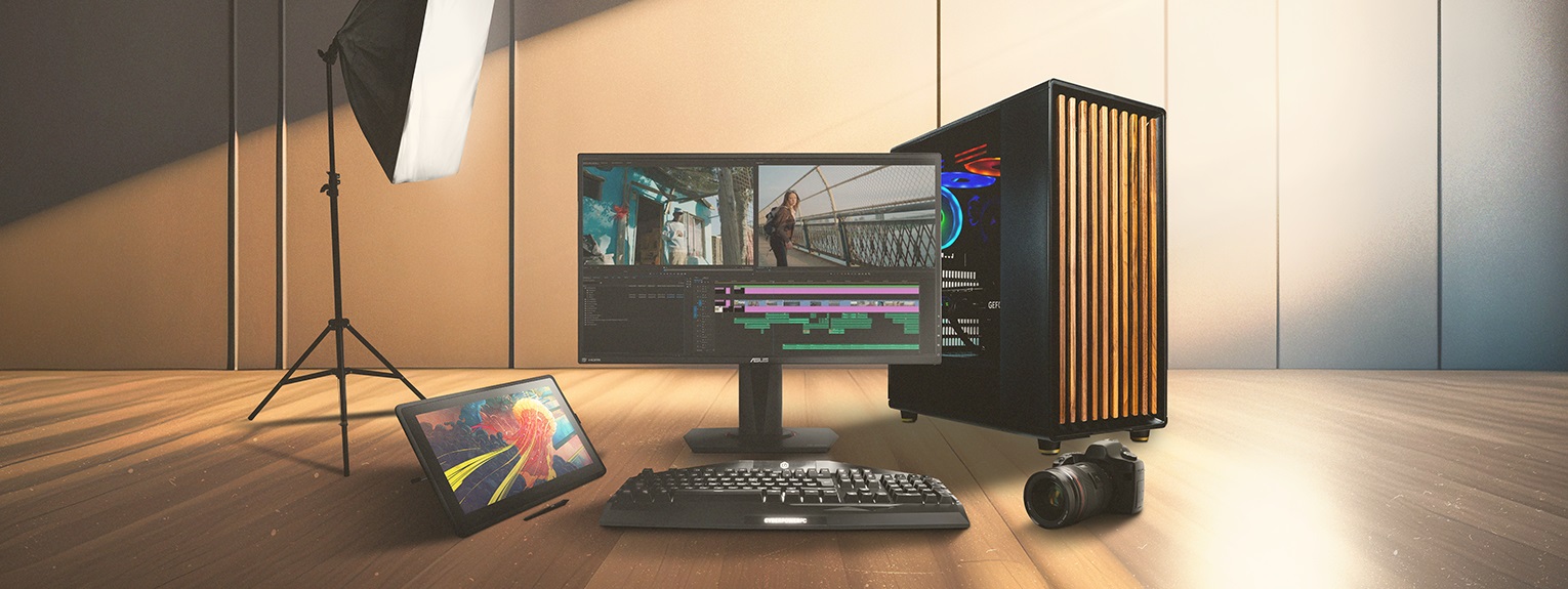 A CyberPowerPC UK video editing PC setup with a tablet and DLSR Camera 
